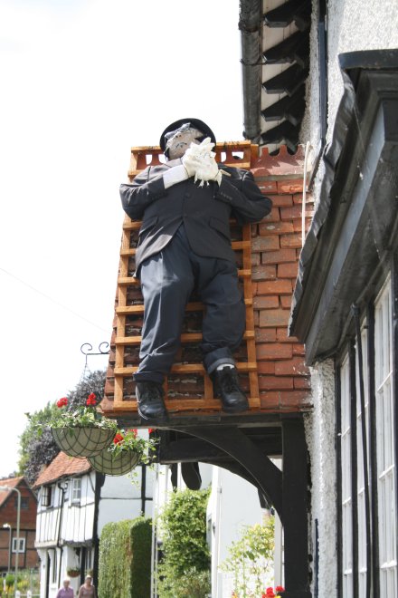 Scarecrow on the pub's porch 1