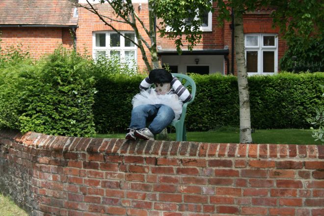 Seated scarecrow